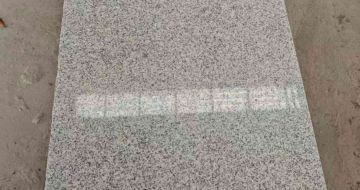 抚顺芝麻白光面毛板