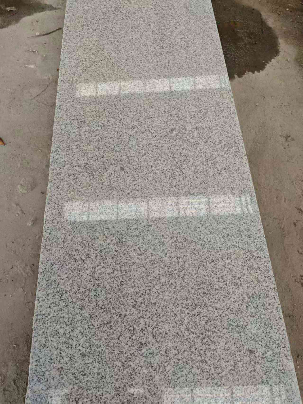 抚顺芝麻白光面毛板